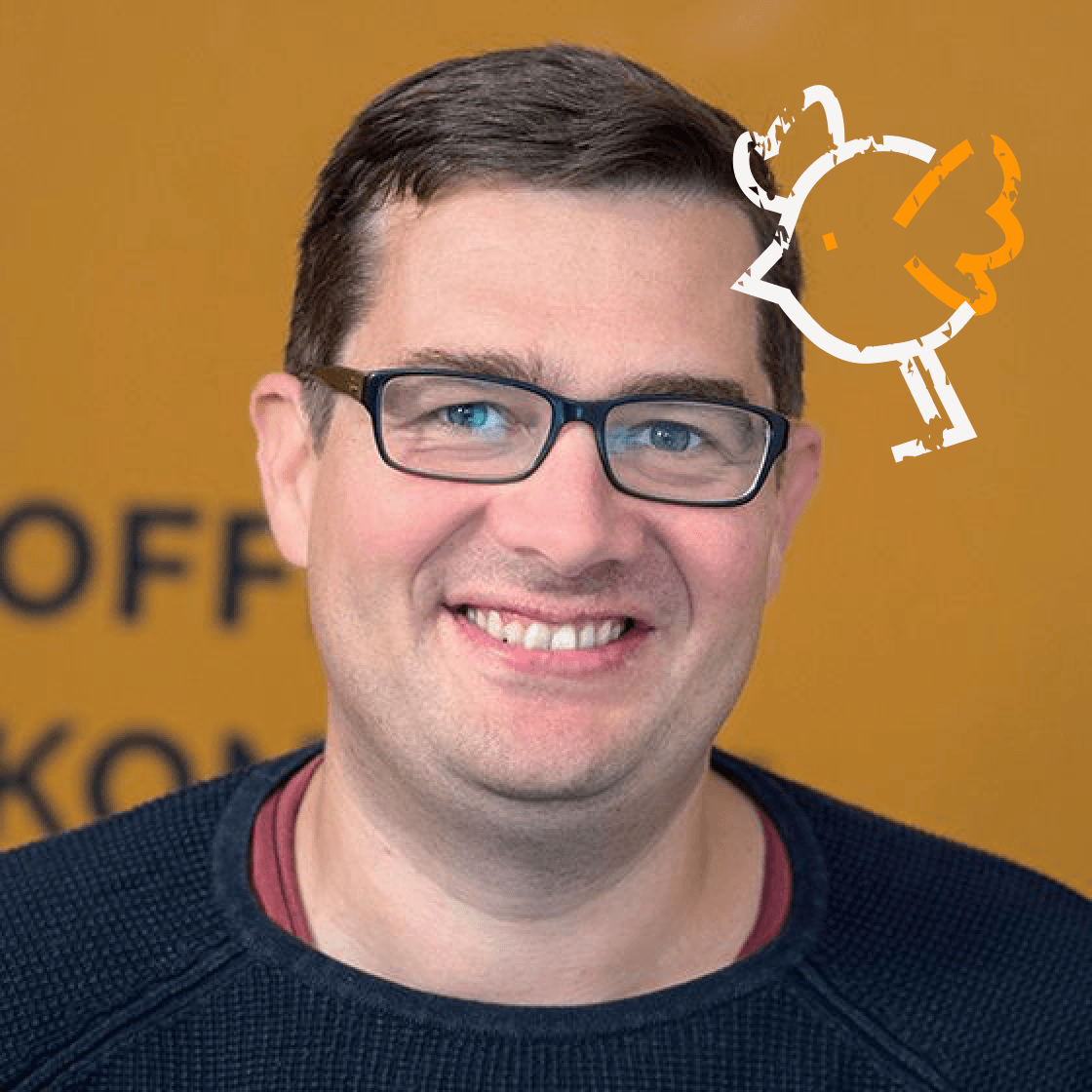 Ein kleiner illustrierter Vogel zeigt mit dem Schnabel auf Roberts Kopf.
