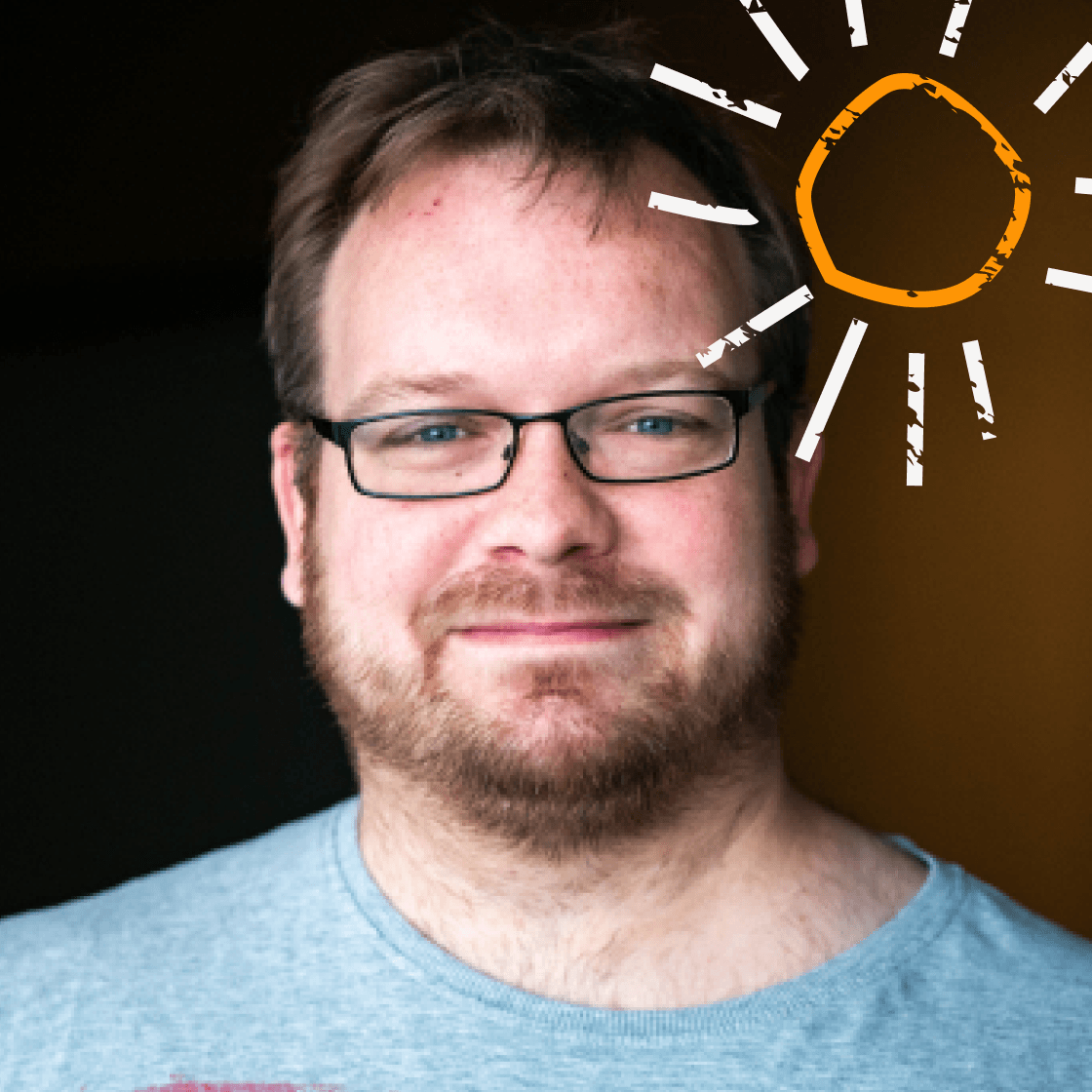 Eine kleine illustrierte Sonne erstrahlt rechts neben Christophs Kopf.