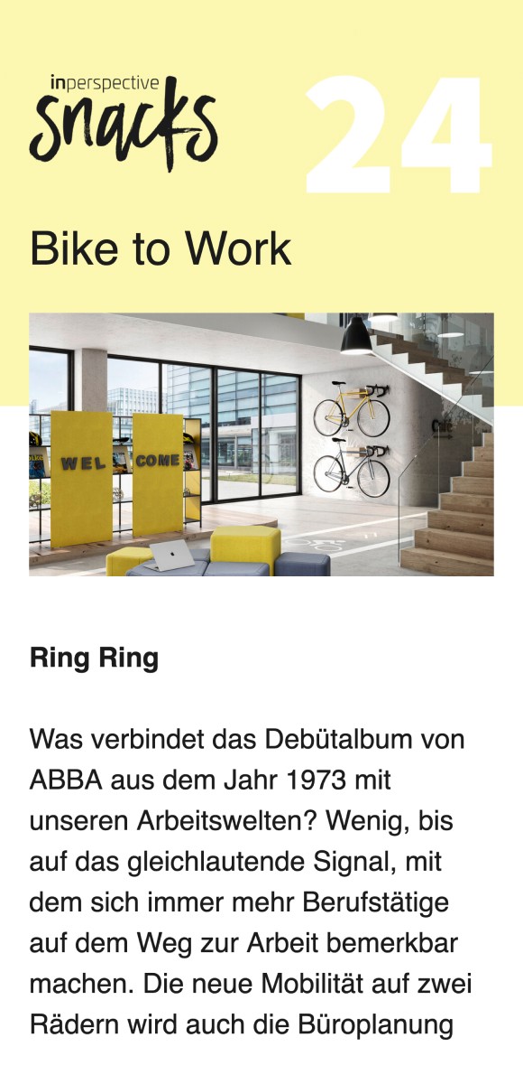 Newsletter-Screenshot mit der Überschrift 'Bike to Work', einem modernen Bürobereich mit gelben Willkommensschildern und an der Wand montierten Fahrrädern, sowie Text über die Verbindung von Fahrradfahren und Büroplanung.