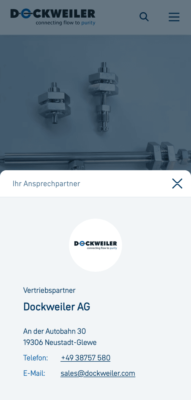 Screenshot der Dockweiler AG Kontaktseite – Vertriebsinformationen mit Firmenanschrift in Neustadt-Glewe, Telefonnummer, E-Mail-Adresse und Logo des Anbieters für Edelstahlrohrsysteme in der Reinraum- und Prozesstechnik.